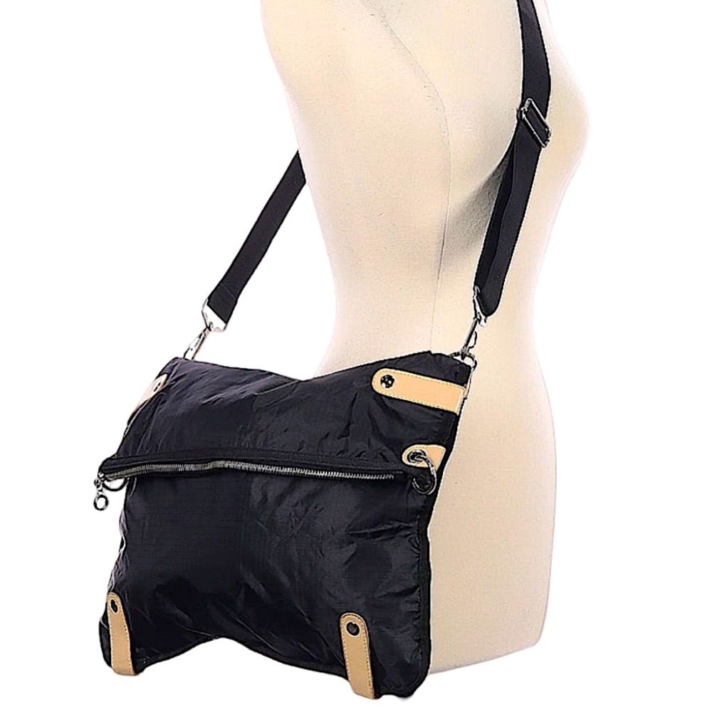 DEAR.NWOT.Crossbody Foldable Bag. The perfect messenger bag!!
